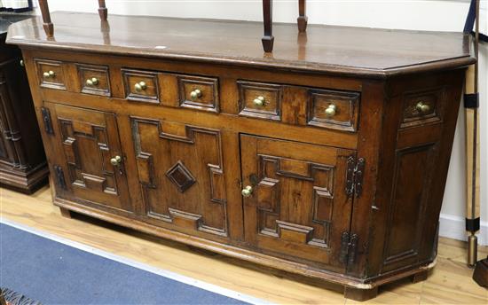 A late 17th century and later oak side cupboard W.180cm